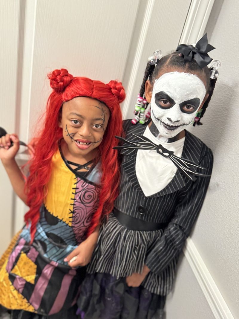 The sisters in Halloween costumes